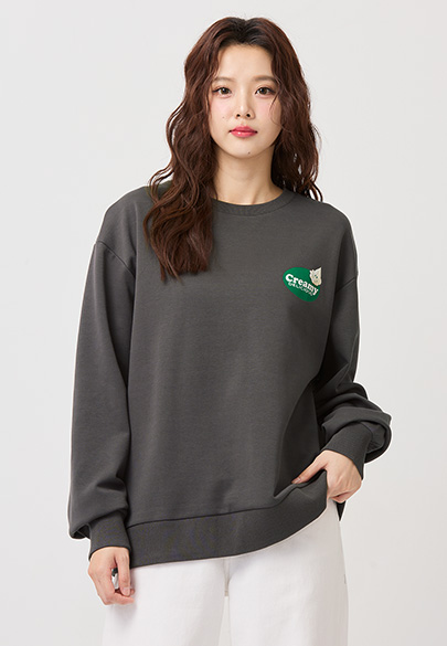 空氣層奶油印花落肩大學T